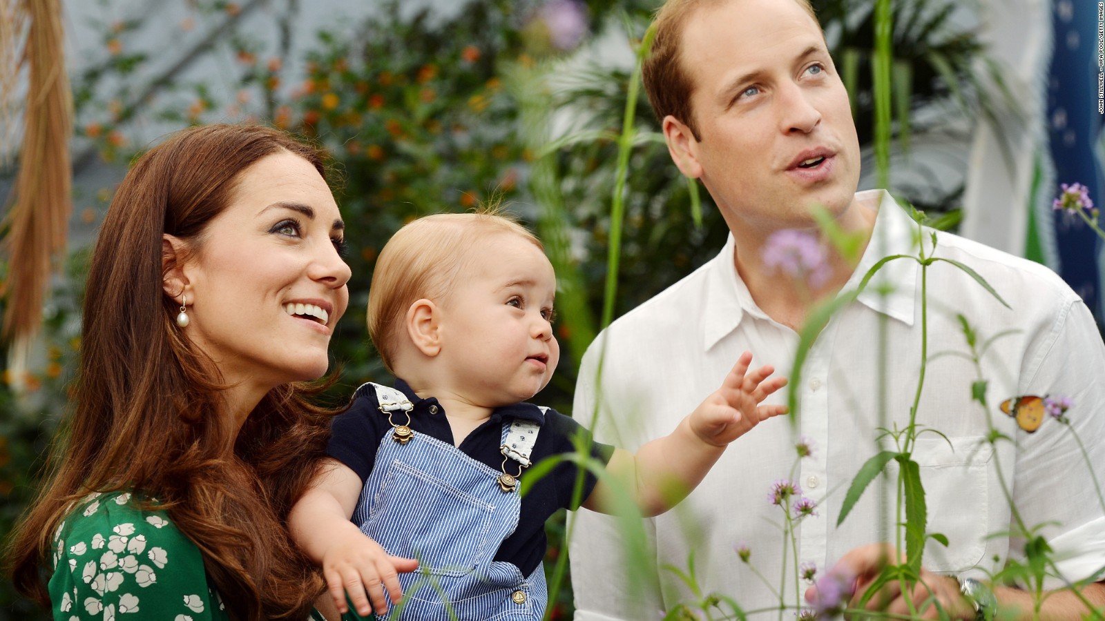 Catherine, Duchess of Cambridge holds Prince George as he and Prince William, Duke of Cambridge's look on while visiting the Sensational Butterflies exhibition at the Natural History Museum on July 2, 2014 in London, England. The family released the photo ahead of the first birthday of Prince George on July 22