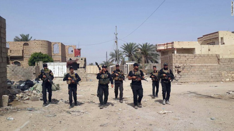 Iraqi counterterrorism forces patrol in Ramadi on April 18. Iraqi special forces maintained control of the provincial capital after days of intense clashes with ISIS left the city at risk. 