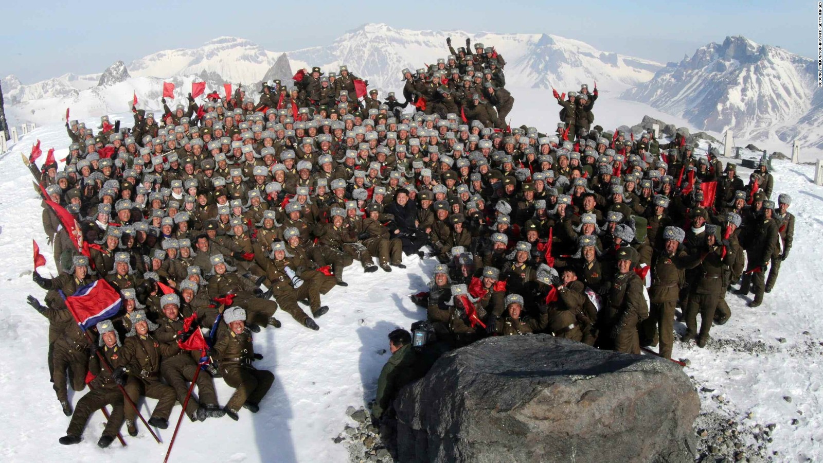Kim Jong-Un, center, posing with his soldiers on a snow-covered top of Mount Paektu in North Korea in an April 18 photo released by south Korean news agency Yonhap.