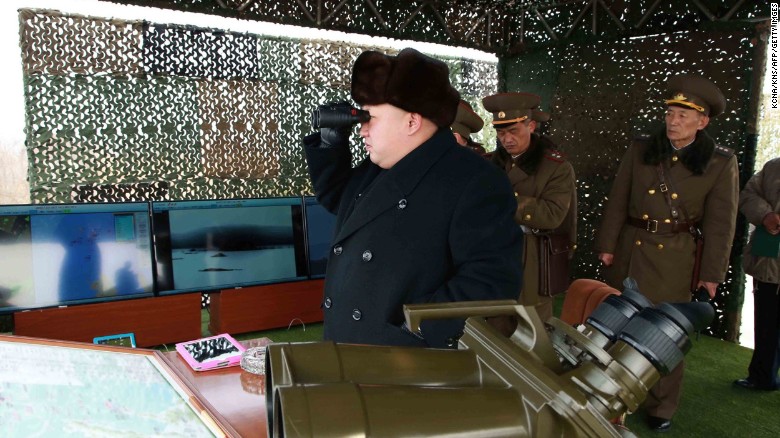 Kim inspects a drill for seizing an island at an undisclosed location in North Korea in an undated picture released by North Korea's official Korean Central News Agency on February 21.
