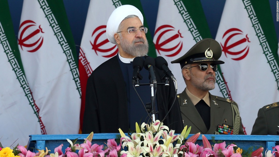 Iranian President Hassan Rouhani reviews the parade April 18.