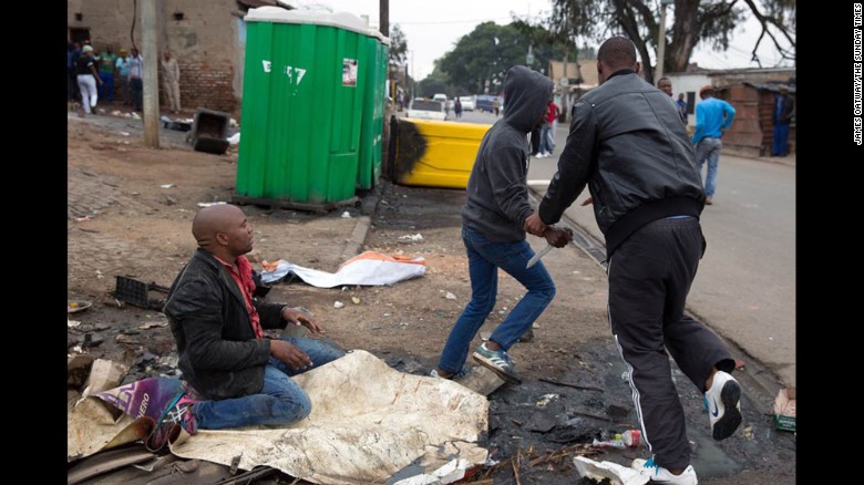 The attackers eventually moved on and left Sithole alone. Oatway and fellow journalist Beauregard Tromp rushed Sithole to a hospital, where he later died.