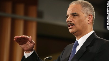Holder: Trump like Nixon in threat to jail Clinton