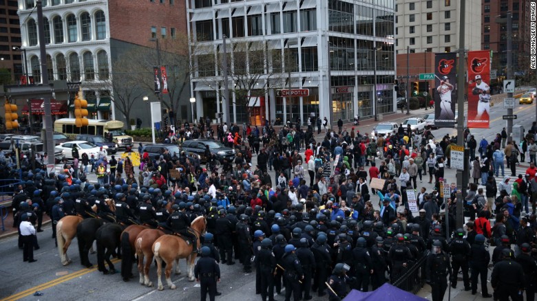Protesters stand off with police during a march in honor of Gray in Baltimore on Saturday, April 25.