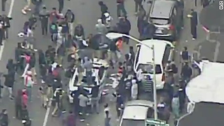 live baltimore protests violent attack police car _00013613