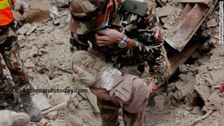 Baby Sonies Awal spent 22 hours buried in the rubble of his home.