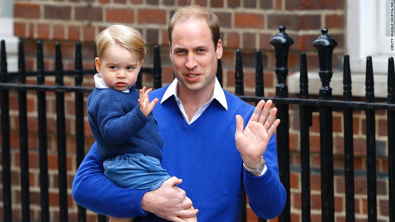 Prince William and his son, Prince George, wave as they visit the hospital after the announcement of the princess&#39;s birth.