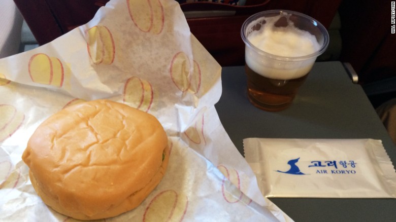 The in-flight meal on Air Koryo is a burger and a glass of North Korean beer.