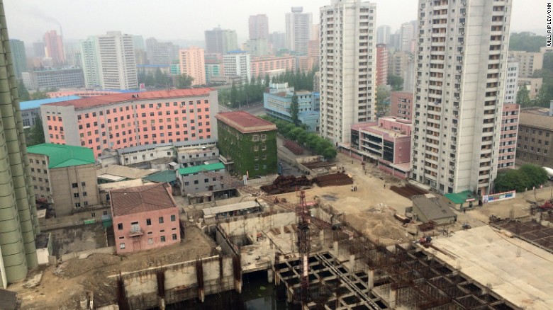 Rebar rises from a building under construction in Pyongyang, the capital city of North Korea, on Sunday, May 3.<br />