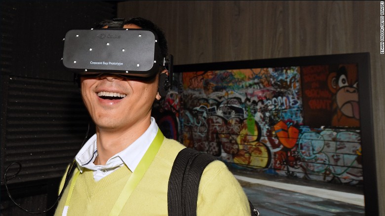 Bin Li tries out Oculus&#39;s Crescent Bay prototype at the 2015 International CES in Las Vegas, Nevada. 