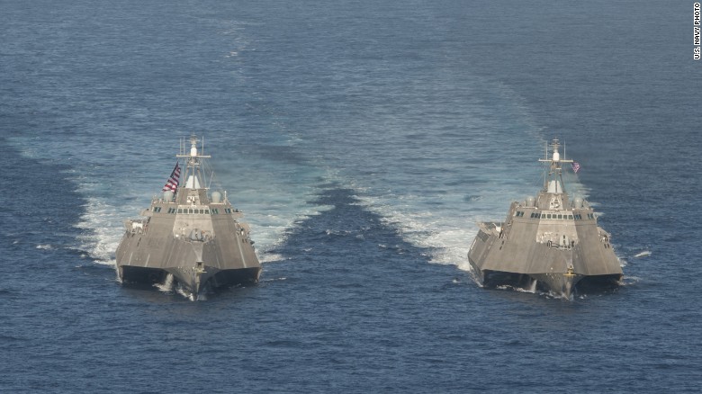 The USS Independence (LCS 2), left, and USS Coronado (LCS 4) steam in the Pacific Ocean. The two are of the Independence variant LCS. Ships of this variant are 416.8 feet in length with a beam of 103.7 feet and a displacement of 3,100 metric tons.