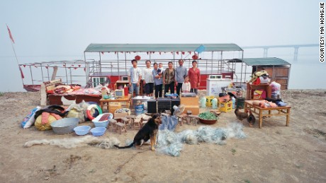 The Sun family currently owns two large steel boats and two small wooden boats, which are worth more than 60,000 yuan altogether. Currently run a floating restaurant, and between this and fishing can bring in more than 30,000 yuan ($9,650) a year. 