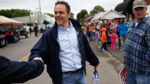 Kentucky Republican senatorial candidate Matt Bevin greets voters at the Fountain Run BBQ Festival while campaigning for the Republican primary May 17, 2014 in Fountain Run, Kentucky. Bevin and Senate Minoriry Leader Mitch McConnell are campaigning heavily throughout the state during the final weekend before the Republican primary to be held May 20.