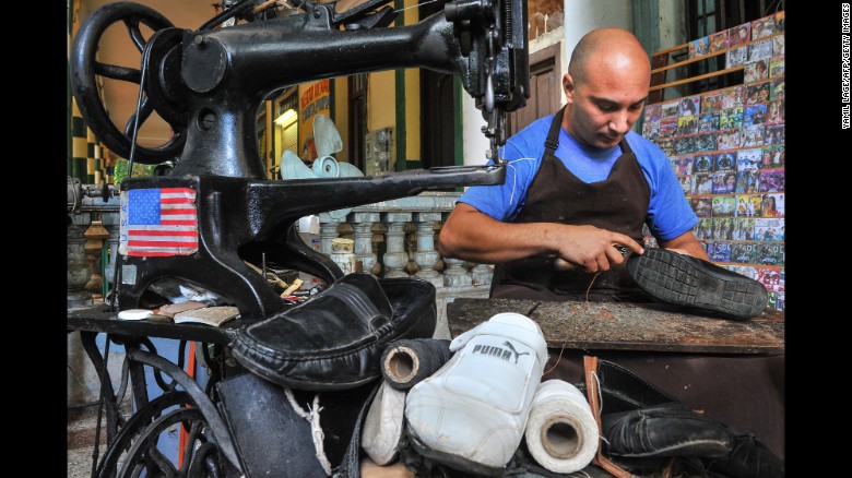 The American flag is displayed on a Havana cobbler&#39;s sewing machine in January.