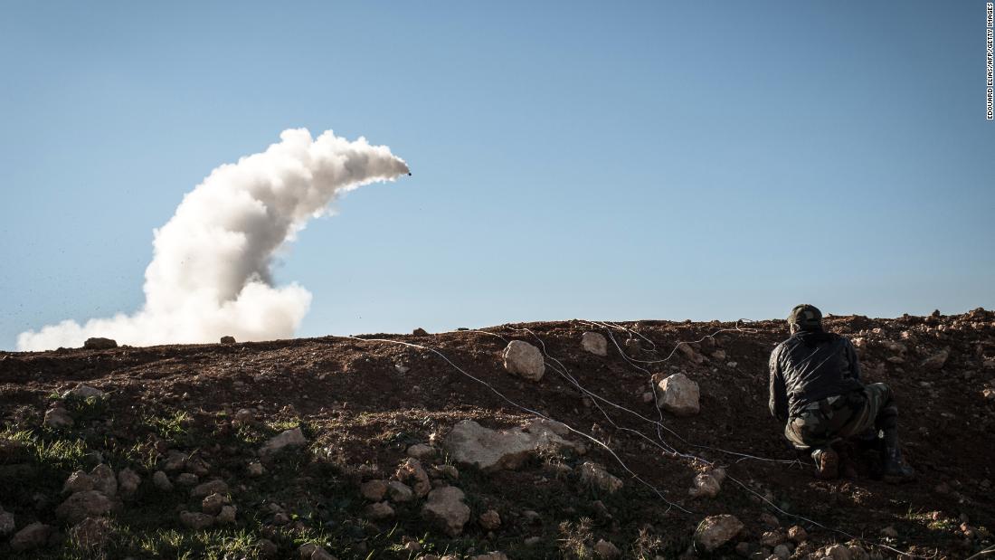 Rebels launch a missile near the Abu Baker brigade in Al-Bab, Syria, on January 16, 2013.