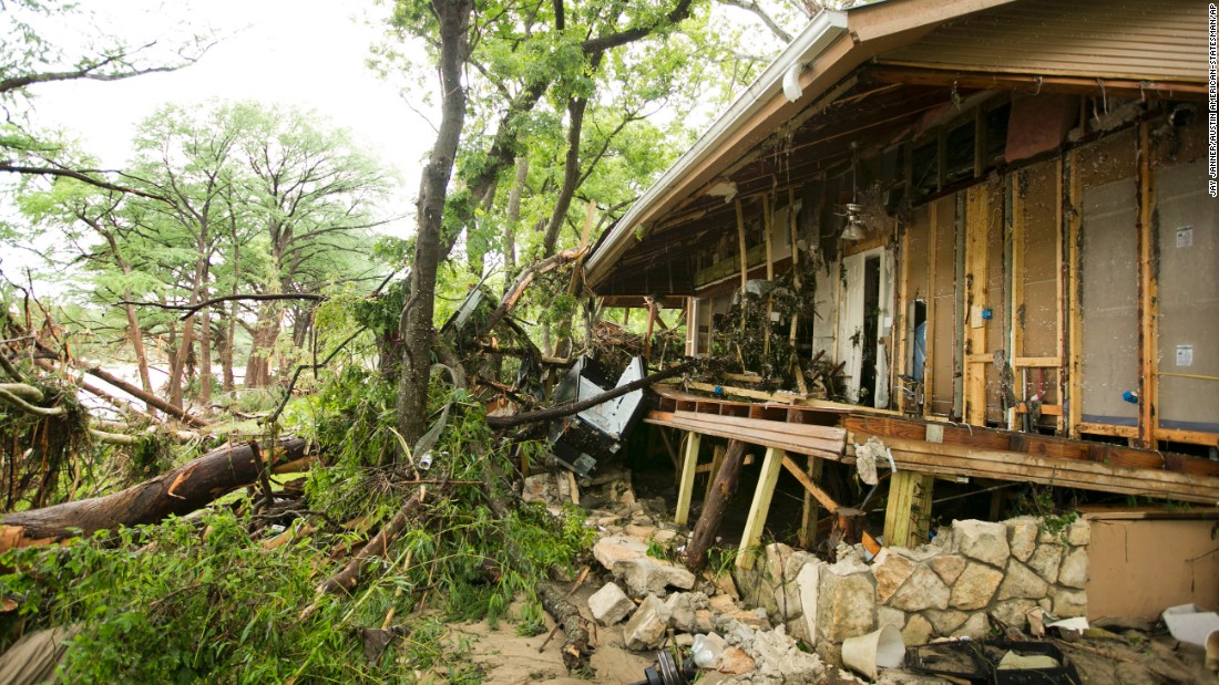 A cabin is damaged at the Rio Bonito Resort on the banks of the Blanco River in Wimberley on May 24.