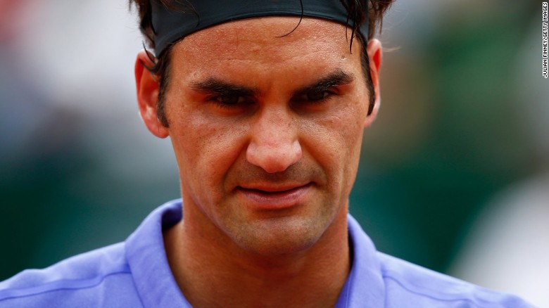Roger Federer was furious after a fan followed him onto the court and tried to get photos after his opening match of the 2015 French Open. 