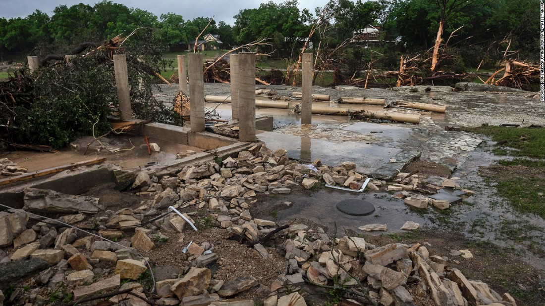 The cement stilts of a family&#39;s home in Wimberley are all that remain on May 25. The home was swept away by floodwaters a day earlier.