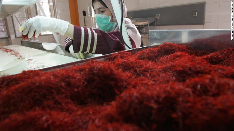 A worker sorts and cleans saffron filaments at Irans Novin Saffron factory in Touss industrial zone in Mashhad.