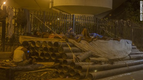 Construction workers asleep in the Delhi heat, Wednesday, May 27.