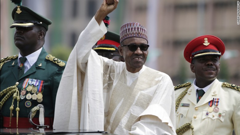 New Nigerian President Muhammadu Buhari salutes supporters during his inauguration in Abuja, Nigeria, on Friday, May 29. The ceremony marked &lt;a href=&quot;http://www.cnn.com/2015/05/29/africa/nigeria-buhari-sworn-in/&quot; target=&quot;_blank&quot;&gt;the first peaceful transfer of power between rival parties&lt;/a&gt; in the African nation. 