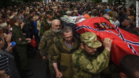 Pro-Russian rebels carry the coffin of <a href="http://www.cnn.com/2015/05/24/europe/ukraine-separatist-commander-killed/index.html">prominent separatist commander Alexei Mozgovoi</a> during his funeral in Alchevsk, Ukraine, on Wednesday, May 27.