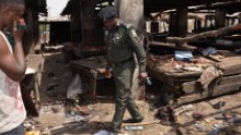 A Nigerian policeman inspects the site of a suicide attack by Boko Haram at a busy cattle market in the northeastern Nigerian city of Maiduguri in June, 2015. Boko Haram overtook ISIS as the world&#39;s deadliest terror group last year, according to the Global Terrorism Index, while Nigeria had the biggest year-on-year increase in terrorism, with deaths up more than 300%.