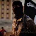 An English-speaking ISIS fighter orchestrates the mass execution of a group of men in an ISIS recruitment video called &quot;Flames of War.&quot;