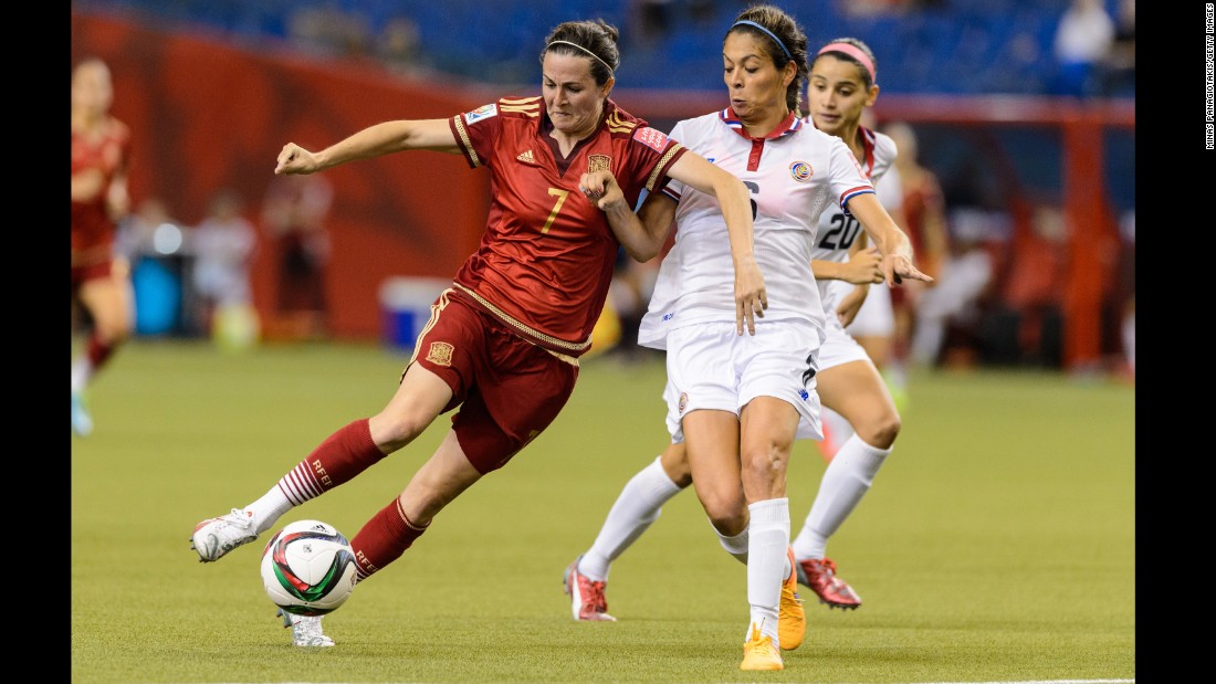 Spain's Natalia Pablos tries to dribble past Costa Rica's Carol Sanchez