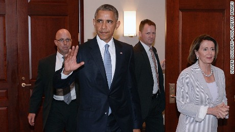 U.S. President Barack Obama and House Minority Leader Nancy Pelosi leave the Gabriel Zimmerman room on Capitol Hill, June 12, 2015 in Washington, D.C. 