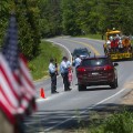 Department of Corrections officers work a roadblock in Saranac, New York on Saturday, June 13. 