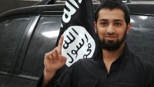 The family of a British teen Talha Asmal say they were "devastated and heartbroken" after ISIS apparently released a photo showing their 17-year-old relative, smiling in front of an ISIS flag.