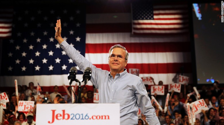 Former Florida Gov. Jeb Bush waves as he takes the stage as he formally announces he is joining the race for president with a speech June 15, 2015, at Miami Dade College in Miami.