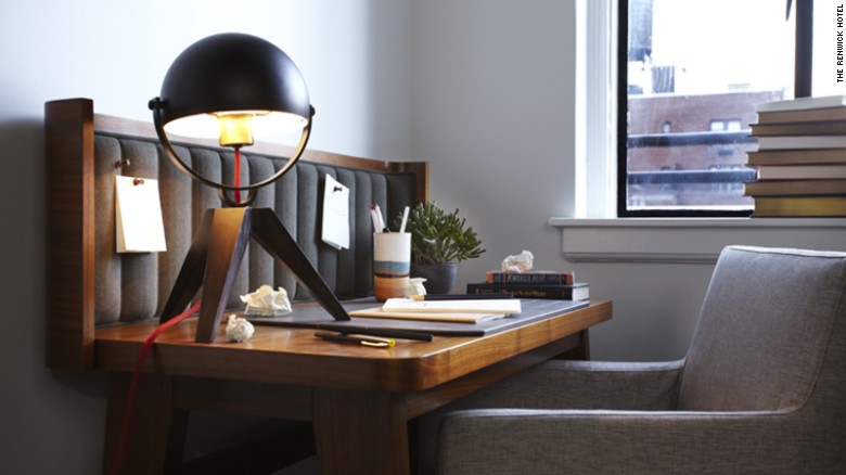 That&#39;s a ceramic pencil holder by Robert Blue sitting on a desk resembling an artist&#39;s workbench.