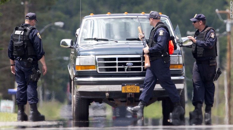 Corrections officers stop a vehicle Monday, June 22, in Owls Head, New York, about 20 to 25 miles west of the prison where convicted killers Richard Matt and David Sweat escaped. The discovery of the escapees&#39; DNA in a cabin has re-energized the 2-week-old search for the fugitives, who staged a movie script-worthy escape from the Clinton Correctional Facility in Dannemora, New York, on June 6.