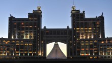 A View of the Khan Shatyry entertainment center (background) through the arch of another of Astana's grandiose buildings.
