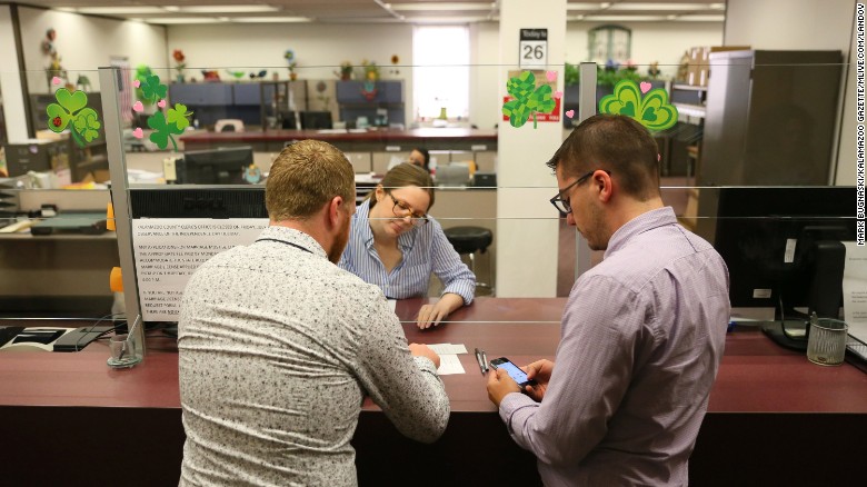 Eric Braman, left, and Kris Katkus were the first to register for a marriage license in Kalamazoo, Michigan, after the Supreme Court ruling.