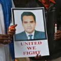 A photograph of TV journalist Akshay Singh at a memorial gathering Monday in Bangalore, India. Singh died after interviewing the family of a suspect in a big corruption case in the state of Madhya Pradesh.