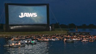 &quot;You yell shark, and we got a panic on our hands.&quot;  Texas&#39; famed Alamo Drafthouse invites movie goers to view Steven Spielberg classic &quot;Jaws,&quot; which turns 40 this year, while floating in inner tubes over murky waters. 