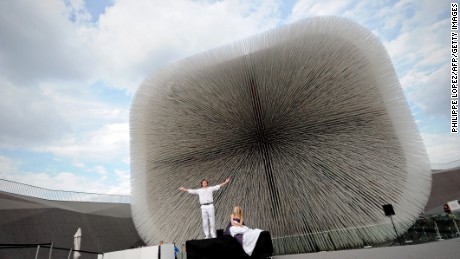 Actors perform in front of the UK Pavilion at the site of the 2010 World Expo  in Shanghai. 