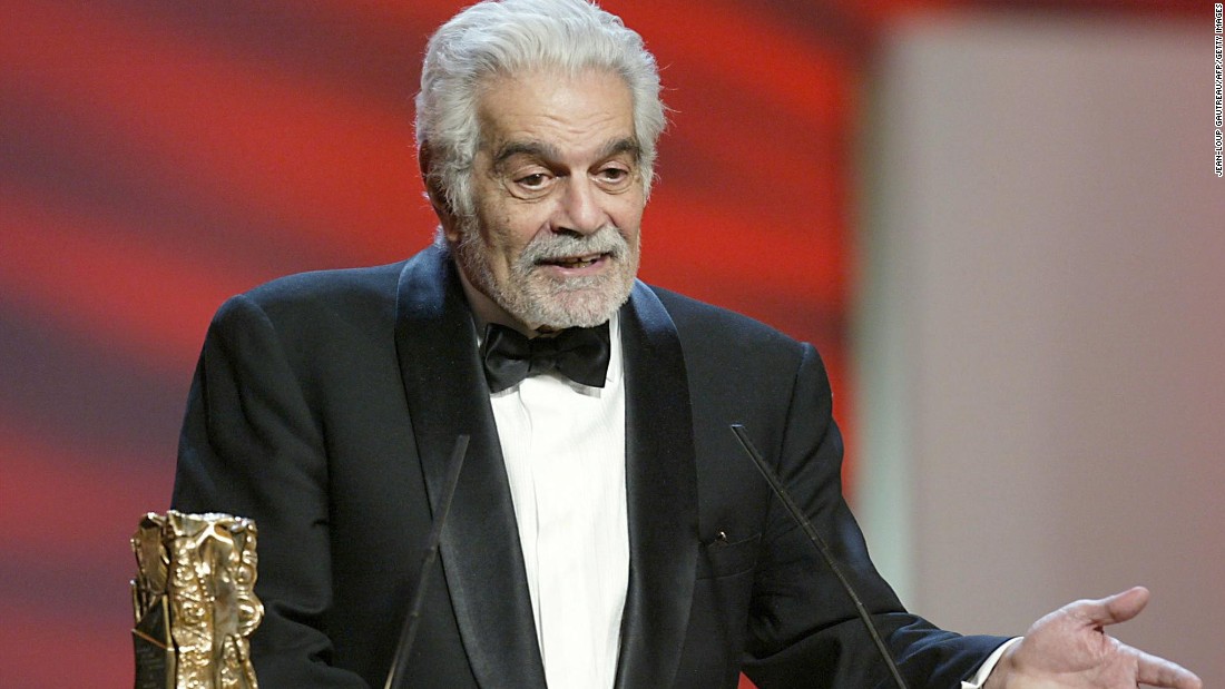 Sharif accepts his Cesar Award at the 2004 ceremony.