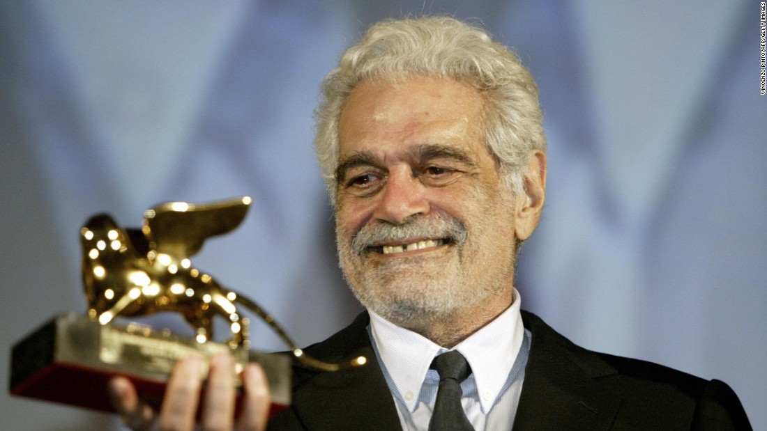 Sharif shows the Golden Lion he received for his career achievement during a ceremony at the Venice Lido in 2003. 