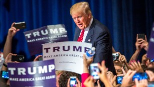 Republican Presidential candidate Donald Trump addresses supporters during a political rally at the Phoenix Convention Center on July 11, 2015 in Phoenix, Arizona. Trump spoke about illegal immigration and other topics in front of an estimated crowd of 4,200.