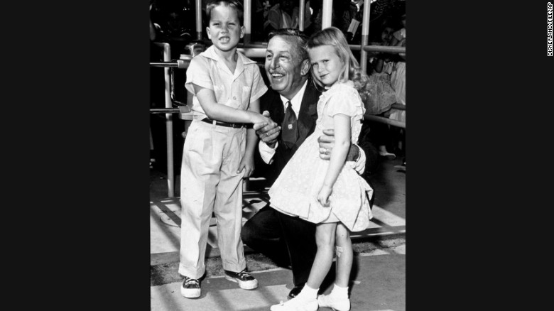 Walt Disney, seen here posing with the park&#39;s first two official visitors, Michael Schwartner, 7, and Christine Vess, 5, didn&#39;t let that first day stop him. He rallied his staff and spent days and nights addressing problems with rides, capacity, food service and merchandise. After only seven weeks, the park had recorded 1 million guests -- and 3.8 million by the end of the first fiscal year. 