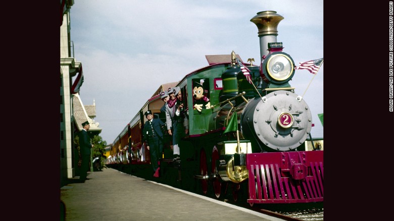 While Disney movie and cartoon characters didn&#39;t wander the park all the time back in the early days, Mickey Mouse was spotted riding in the locomotive cab of a circus train July 18, 1955. The animated version of this train was featured in the Disney film, &quot;Dumbo.&quot; 