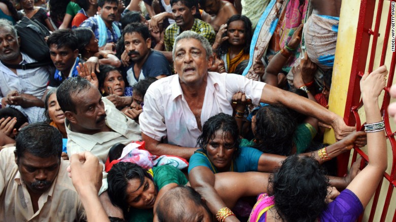 Indian devotees after a stampede at a religious festival in Godavari in the Rajahmundry district on July 14.