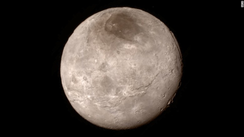 Remarkable new details of Pluto&#39;s largest moon, Charon, are revealed in this image released on July 15.