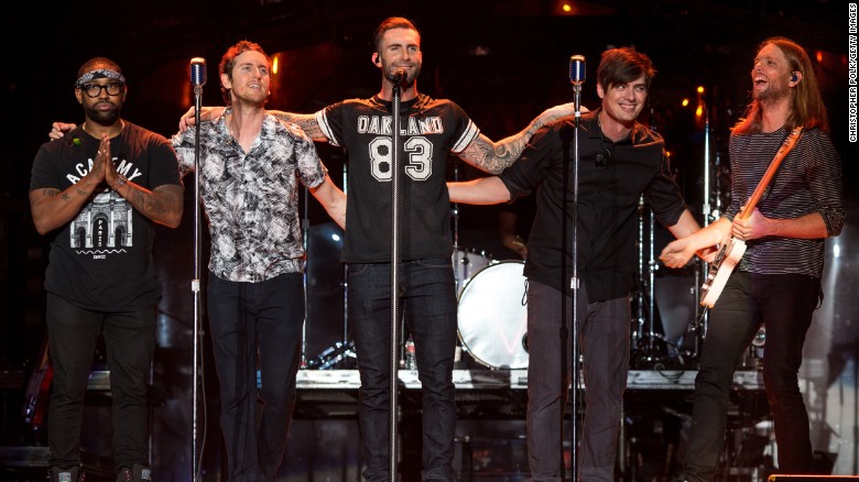 Michael Madden, PJ Morton, Adam Levine, James Valentine, Jesse Carmichael, and Matt Flynn of Maroon 5 perform at The Forum on April 4, 2015 in Inglewood, California. 