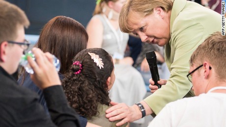 Refugee confronts Merkel