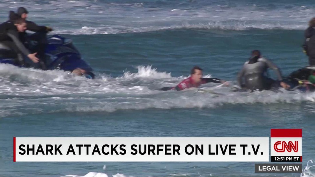 Shark attacks surfer on live tv CNN Video